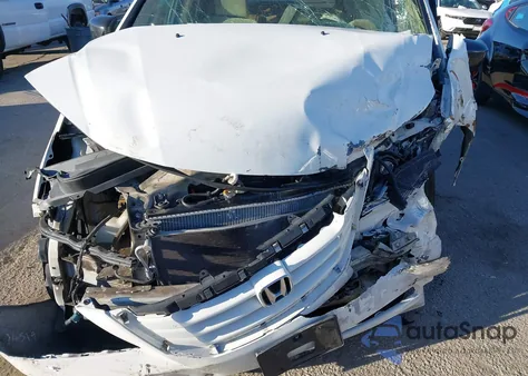 2009 Honda Odyssey Lx from USA, damaged, VIN 5FNRL38259B034519